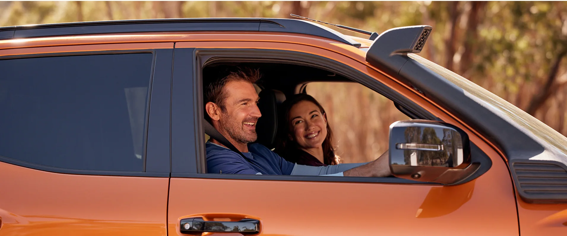 Triton Couple Driving